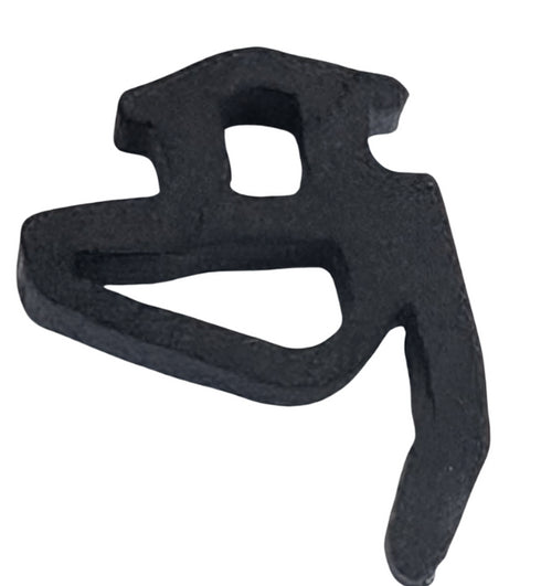 Black plastic component on a white background